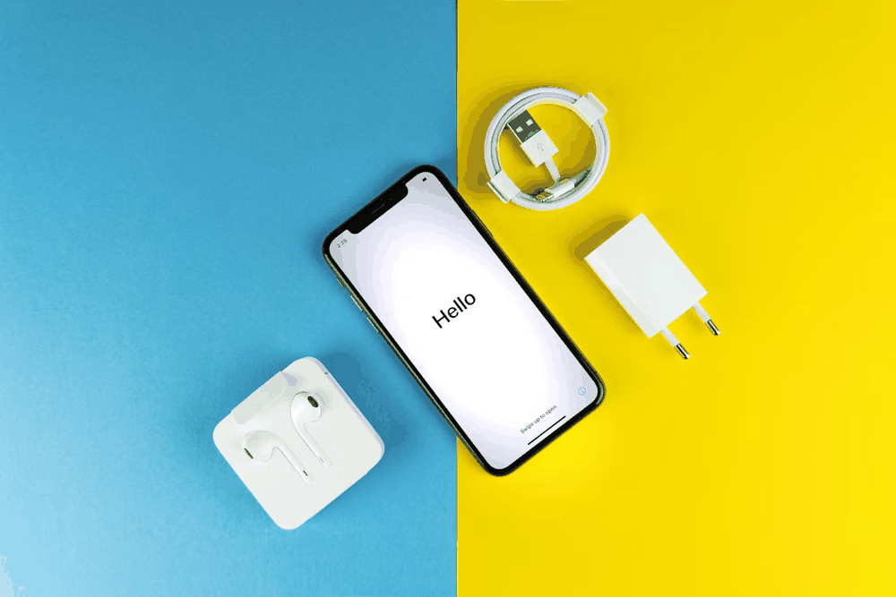 Wireless headphones and accessories on a desk